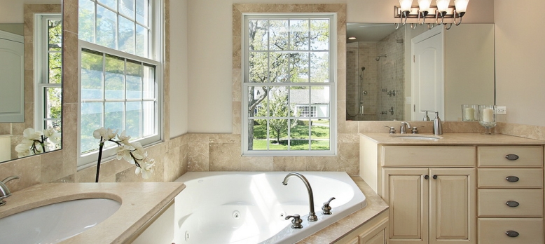 Master bath with tub in new construction home