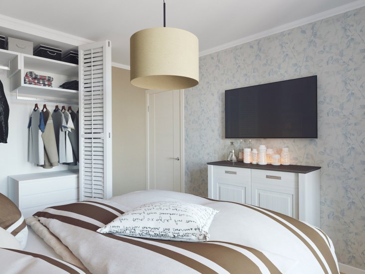 Дизайн спальни с гардеробной за кроватью