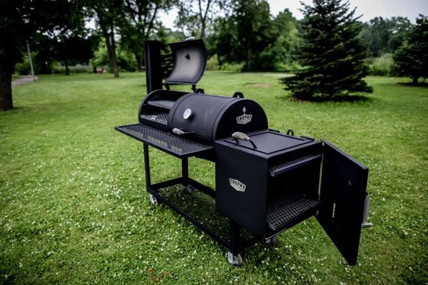 Outdoor large BBQ Pit with open grill & smoker door