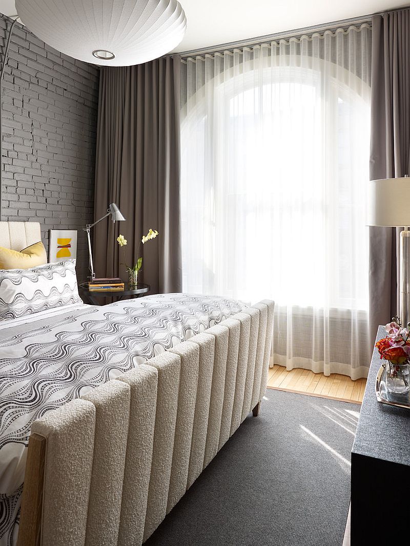 Кирпичные стены в спальне - серый цвет интерьера