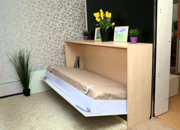 Компактную тумбу-кровать часто используют в детской комнате